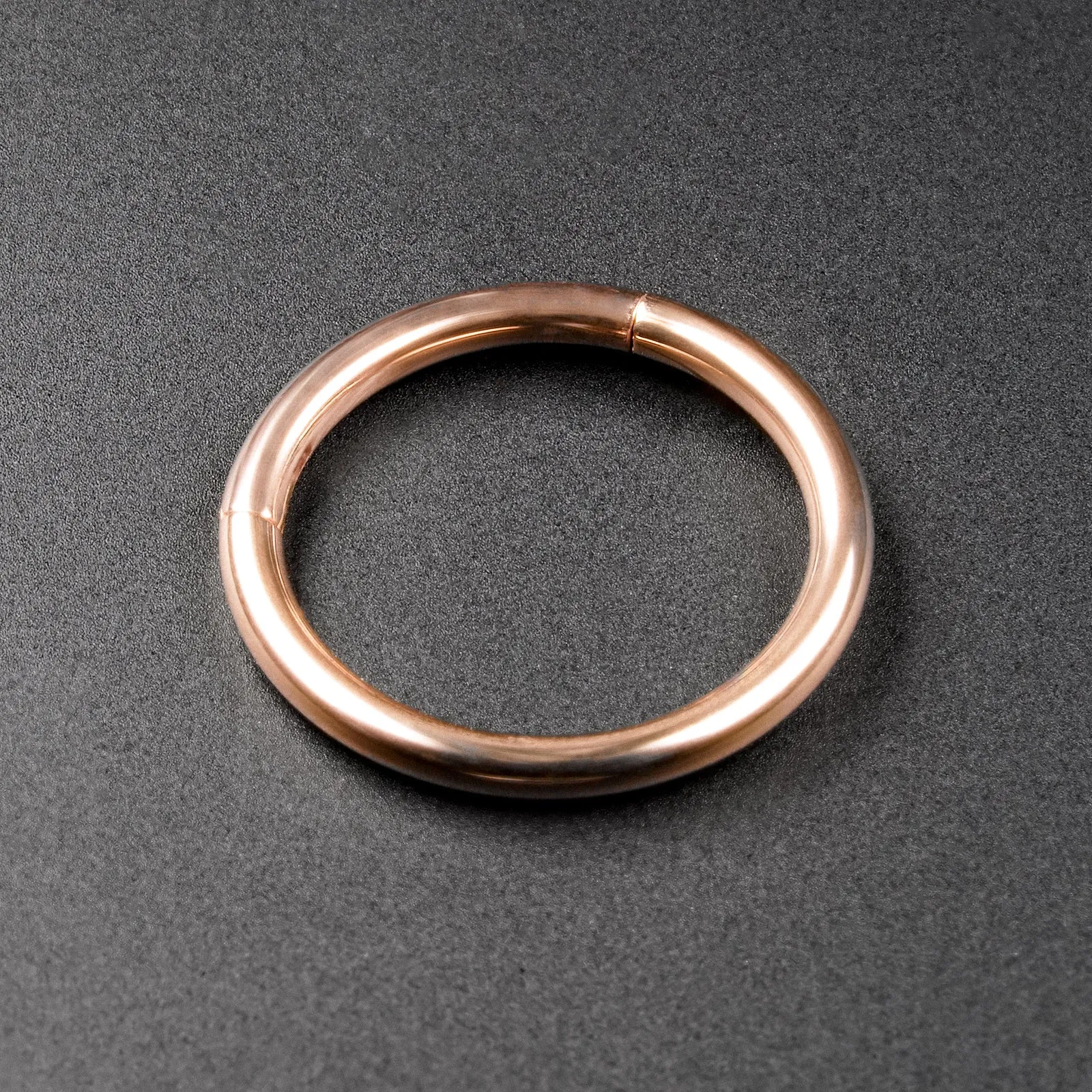 Rose Gold PVD Titanium Hinged Segment Ring