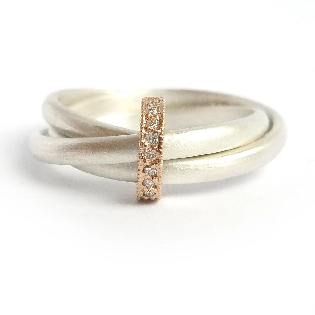 Silver, 18ct gold ring with 9 diamonds - size N