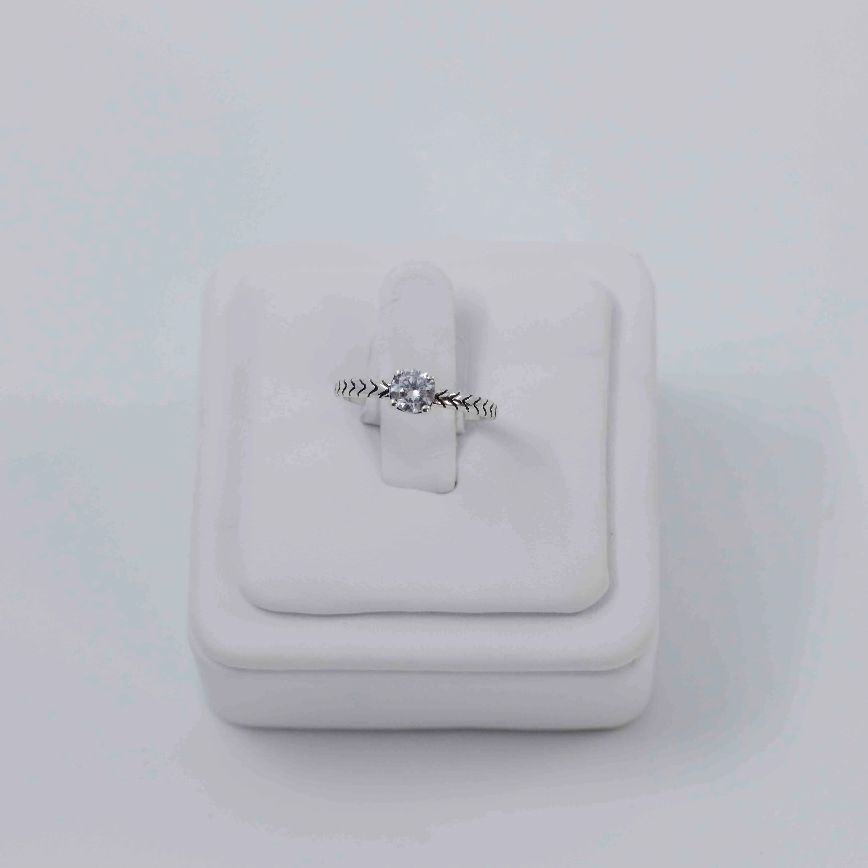 Simple solitaire silver ring